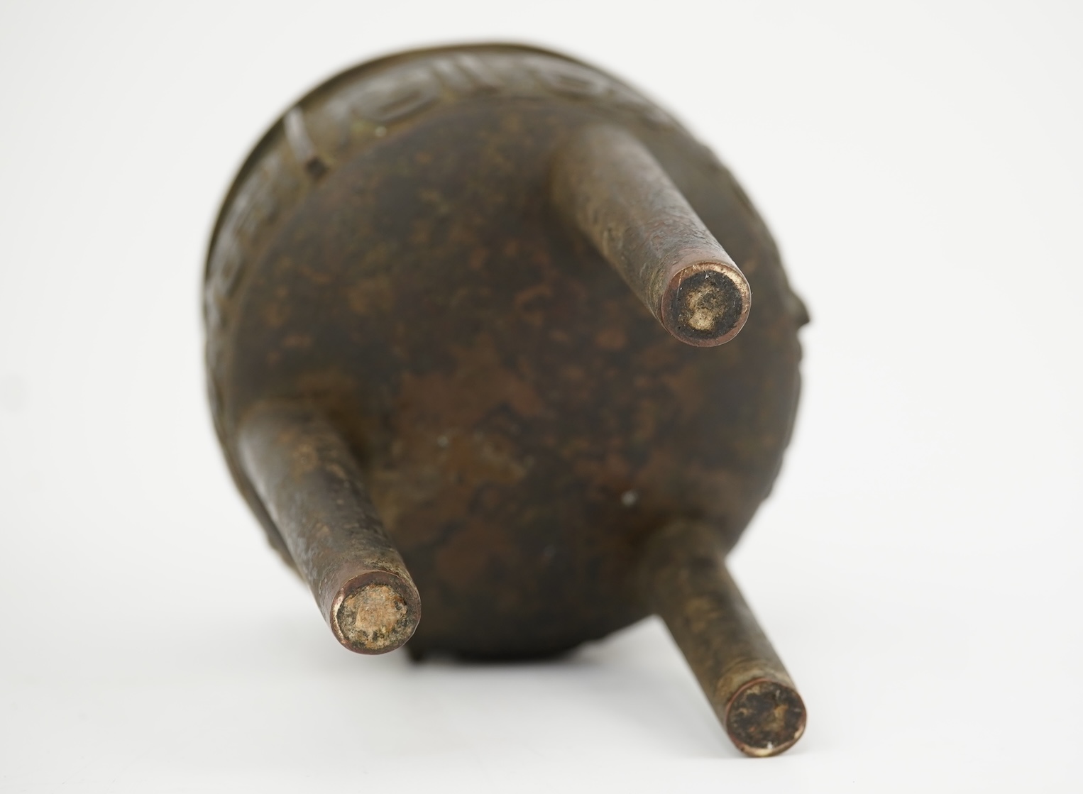A Chinese bronze tripod censer and cover, ding, late Ming Dynasty